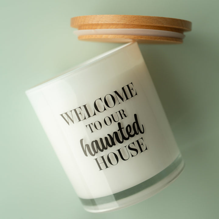 WELCOME TO OUR HAUNTED HOUSE CANDLE