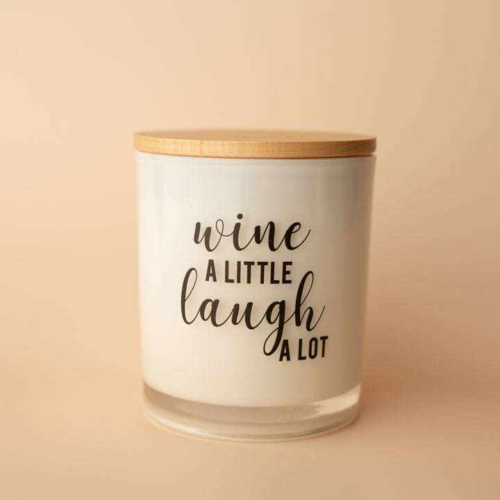 WINE A LITTLE LAUGH A LOT CANDLE\